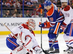 Montreal Canadiens goaltender Carey Price makes a save on Edmonton Oilers forward Leon Draisaitl during a previous meeting this season at Rexall Place. (Perry Nelson-USA TODAY Sports)