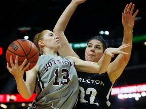 uOttawa Gee-Gees' Catherine Traer, 13, shoots over Carleton University Ravens' Heather Lindsay, 22, during the 10th annual MBNA Capital Hoops Classic at the Canadian Tire Centre Friday February 05, 2016. Darren Brown/Postmedia Network