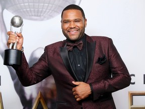 Actor Anthony Anderson poses backstage with his award for Outstanding Actor in a Comedy Series for his role on "black-ish" during the 47th NAACP Image Awards in Pasadena, California February 5, 2016.  REUTERS/Danny Moloshok