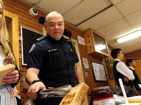 Toronto Police officer Peter de Quintal is known as the StarWarsCop and works as a school resource officer at Chaminade College and hosts a weekly before school breakfast in the lobby with Star Wars related toast on Tuesday February 2, 2016. Michael Peake/Toronto Sun/Postmedia Network