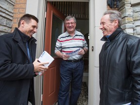 Ontario Progressive Conservative leader Patrick Brown (left) canvasses with Lorne Coe, candidate for the byelection in Whitby-Oshawa while they chat with resident Norm Sawula in Whitby, Ont. on Monday February 1, 2016. Ernest Doroszuk/Toronto Sun/Postmedia Network