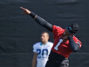 Carolina Panthers quarterback Cam Newton jokes with teammates during practice in preparation for the Super Bowl 50 football game Friday Feb. 5, 2016 in San Jose, Calif. (AP Photo/Marcio Jose Sanchez)