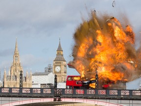 Bus Explodes on Lambeth Bridge for filming of Jackie Chan Movie The Foreigner. (WENN.com)