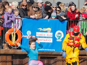 Whig-Standard reporter Steph Crosier takes part in the Polar Plunge at the Confederation Basin marina on Sunday. (Julia McKay/The Whig-Standard)