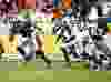 Carolina Panthers quarterback Cam Newton (1) scrambles from the Denver Broncos defense in the second half in Super Bowl 50 at Levi's Stadium in Santa Clara on Feb. 7, 2016. (Mark J. Rebilas/USA TODAY Sports)