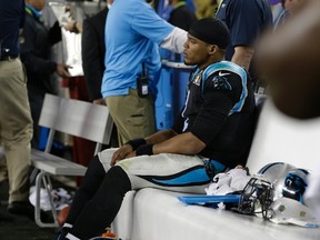 Carolina Panthers’ Cam Newton (1) sits on the bench during the second half of the NFL Super Bowl 50 football game against the Denver Broncos Sunday, Feb. 7, 2016, in Santa Clara, Calif. (AP Photo/Marcio Jose Sanchez)