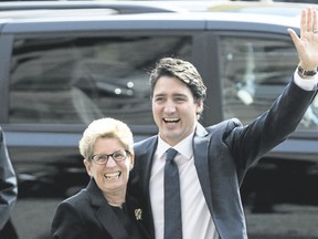 Kathleen Wynne and Justin Trudeau on Oct. 27, 2015.   Mark Blinch/Reuters files)