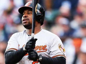 Delmon Young #27 of the Baltimore Orioles reacts as he strikes out in the second inning against the Detroit Tigers during Game Three of the American League Division Series at Comerica Park on October 5, 2014 in Detroit, Michigan.   Leon Halip/Getty Images/AFP