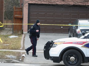 York Regional Police at the scene of a murder on Harding Blvd. W., near Yonge St. and Major Mackenzie Dr., in Richmond Hill Monday, February 8, 2016. Robert Veltheer, 77,  was found dead and his son is charged with murder. (Jack Boland/Toronto Sun)