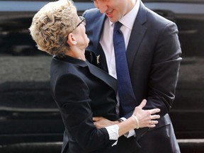 Justin Trudeau is greeted at Queen's Park by Ontario Premier Kathleen Wynne on Tuesday October 27, 2015 after winning the Oct. 19 federal election. (Michael Peake/Toronto Sun)