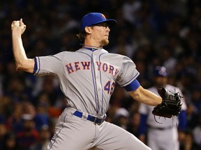New York Mets pitcher Tyler Clippard throws during the eighth inning of Game 3 of the National League Championship Series against the Chicago Cubs Tuesday, Oct. 20, 2015, in Chicago. (AP Photo/Nam Y. Huh)