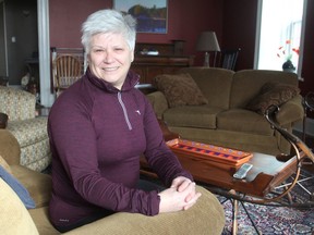 Carole Russell, in her home in Amherstview, is a member of a five-woman group that is sponsoring a Syrian refugee family and bringing them to Canada in the next few weeks. (Michael Lea/The Whig-Standard)