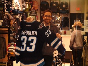 Dylan Schwark, Jets Gear Store manager, is happy Dustin Byfuglien will stay in Winnipeg.