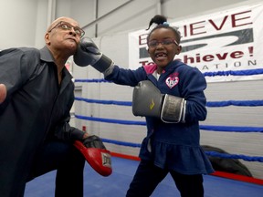 Spider Jones works in the ring with Celeste Dailey during  “Believe to Achieve” non-profit organization at “Spider’s Web" After-School Drop-in Centre in Toronto on Monday, February 8, 2016. (Dave Abel/Toronto Sun/)