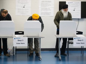 Voters cast ballots in the advance poll in Edmonton's Ward 12 on Monday. (TREVOR ROBB)