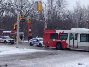 Scene where a bus hit a pedestrian crossing the Transitway at Iris on Feb. 9, 2016. (Vito Pilieci/Postmedia Network)