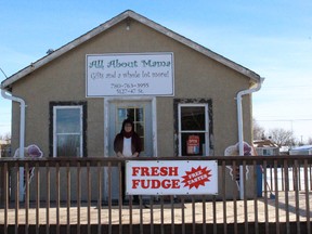 Lisa Symington stands in front of her store, All About Mama, in Mannville. After close to seven years in business, Lisa and her sister Erin decided to close shop to spend more time with family.