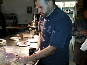 Chef Paul Shufelt pre-smokes our pork rib roast. Photo: Graham Hicks