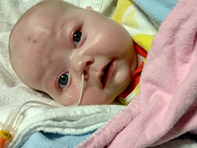 Four-month-old Presley Barnier, of Dresden, remains in a London hospital fighting for her life while doctors try to find out why the baby isn't achieving normal weight gains. (Handout)