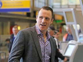 Former Toronto Maple Leaf Dion Phaneuf checks in at the Calgary International Airport en route to Detroit after being traded to the Ottawa Senators on Tuesday February 9, 2016
(Gavin Young/Postmedia)