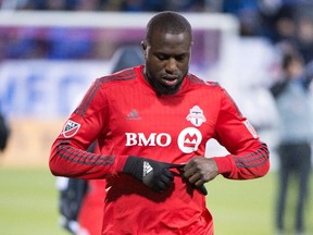 Toronto FC forward Jozy Altidore (17) leaves the pitch after losing 3-0 to the Montreal Impact in Major League Soccer sudden death playoff game Thursday, October 29, 2015 in Montreal.THE CANADIAN PRESS/Ryan Remiorz