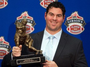 Montreal Alouettes' offensive tackle Josh Bourke holds his award for the CFL Outstanding Linesman, in Vancouver on November 24, 2011. The Toronto Argonauts have agreed to terms with the Windsor, Ont., veteran offensive lineman. THE CANADIAN PRESS/Jonathan Hayward