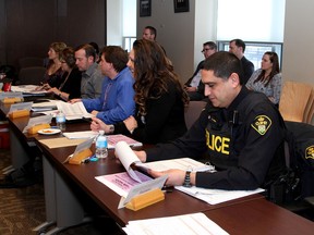 Ontario Provincial Police Const. Roop Sandhu of the Frontenac Detachment takes part in the inaugural Community Risk Watch meeting at Kingson Police headquarters in Kingston on Tuesday. (Ian MacAlpine/The Whig-Standard)