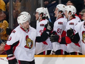 Milan Michalek of the Ottawa Senators is congratulated by teammates after scoring against the Nashville Predators at Bridgestone Arena on November 10, 2015 in Nashville. (Frederick Breedon/Getty Images/AFP)