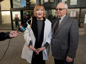 Donna Bagdan and her partner Brian Heidecker speak to the media outside the Edmonton Law Courts after the sentencing of Tyhler Kennedy Keith on Tuesday. Keith received 5 years for the Nov. 1, 2013 car crash that killed Brennan Dorian Bagdan. (DAVID BLOOM)