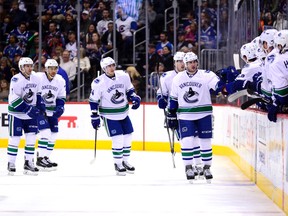 Canucks defenceman Matt Bartkowski (44) celebrates his goal in the second period against the Avalanche in Denver on Tuesday, Feb. 9, 2016. (Ron Chenoy/USA TODAY Sports)