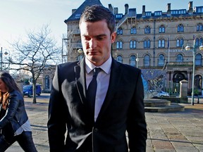 Sunderland winger Adam Johnson arrives at Bradford Crown Court, England, Wednesday Feb. 10, 2016. Johnson has pleaded guilty in court to one count of sexual activity with a child and another of grooming.  (Peter Byrne/PA via AP)