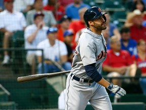 Detroit Tigers right fielder J.D. Martinez (28) hits a two-run home run during the first inning against the Texas Rangers  at Globe Life Park in Arlington. Kevin Jairaj-USA TODAY Sports