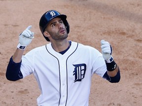 J.D. Martinez of the Detroit Tigers celebrates after hitting a home run against the Seattle Mariners on July 21, 2015 at Comerica Park in Detroit. (Leon Halip/Getty Images/AFP)