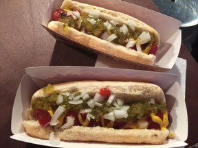 This Tuesday, Feb. 9, 2016, photo, shows a Burger King "classic" hot dog at a media event to introduce the restaurant's new menu item, in New York. Burger King plans to start selling the hot dogs in the U.S. on Feb. 23. The company says it will offer two options of grilled dogs, a “chili cheese” and “classic” that has relish, onions, ketchup and mustard. (AP Photo/Candice Choi)
