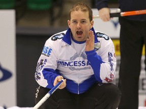 Skip Reid Carruthers calls in a rock during the provincial men's curling championships in Selkirk, Man. Wednesday February 10, 2016.
Brian Donogh/Winnipeg Sun/Postmedia Network