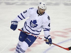 Nazem Kadri reacted to a hit from Flames captain Mark Giordano Tuesday by making a throat-slashing gesture at the Calgary defenceman. (Al Charest)