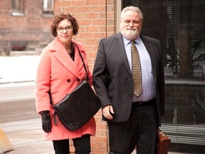 Dr. William Hughes enters The College of Physicians and Surgeons of Ontario on College St. in Toronto, Ont. prior to his hearing on Wednesday, Feb. 10, 2016. Jason Bain/Peterborough Examiner/Postmedia Network