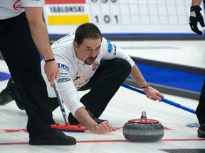 Kevin Park curls against Greg Pasichnuk during the first draw of the 2016 Boston Pizza Cup in Camrose on Wednesday.