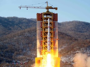 This Feb. 7, 2016 image released by the Korean Central News Agency (KCNA) and distributed by the Korea News Service (KNS) shows a rocket lifting off, said to be carrying North Korea's Earth observation satellite Kwangmyongsong-4, at the Sohae launch pad in Tongchang-ri, North Korea. (Korean Central News Agency/Korea News Service via AP)