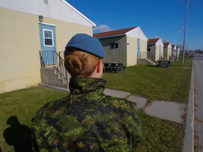 Intelligencer file photo/Luke Hendry
A member of the Canadian Armed Forces stands outside the cadet barracks at CFB Trenton. The barracks had been winterized in the fall to house Syrian refugees, but the Canadian government confirmed this week only two bases — Kingston and Valcartier — remains as potential homes for refugees.