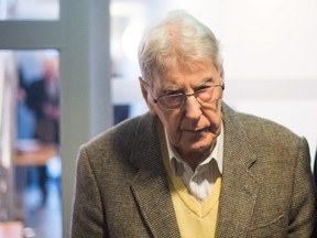 Former SS guard at the Auschwitz death camp Reinhold Hanning, 94, arrives for his trial in Detmold, Germany, on Feb. 11, 2016. Hanning faces trial for 170,000 counts of accessory to murder, the first of up to four cases being brought to court this year in an 11th-hour push by German prosecutors to punish Nazi war crimes. (Bernd Thissen/Pool Photo via AP)