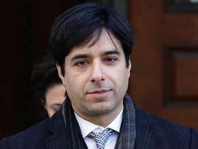 Jian Ghomeshi leaves Old City Hall after closing arguments in his trial on Feb. 11, 2016. (Craig Robertson/Toronto Sun)