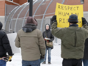 Rally organizer Julie Comber speaks outside the Brockville Mental Health Centre's forensic treatment unit during a protest against the treatment of Saskatchewan inmate Marlene Carter on Thursday, February 11, 2016 in Brockville, Ont. (Darcy Cheek/Brockville Recorder and Times/Postmedia Network)