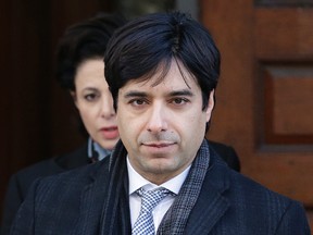 Jian Ghomeshi  leaves  Old City Hall after closing arguments in his trial Thursday. (Craig Robertson/Toronto Sun/Postmedia Network)
