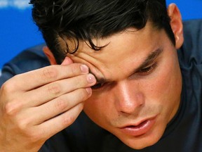 Milos Raonic reacts during a news conference after losing to Andy Murray in the semifinals of the Australian Open at Melbourne Park, Australia, January 29, 2016. (REUTERS/Issei Kato)