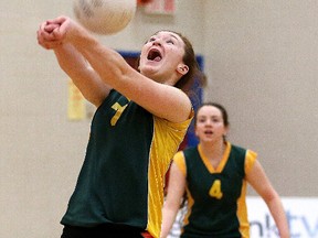 Confederation Chargers Natasha Gervais bumps the ball as team mate Mykayla Beeson looks on during senior girls volleyball action against Macdonald Cartier in Sudbury, Ont. on Tuesday February 9, 2016. Gino Donato/Sudbury Star/Postmedia Network