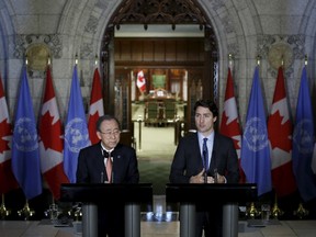 Prime Minister Justin Trudeau (R) speaks during a news conference with United Nations Secretary-General Ban Ki-moon on Parliament Hill in Ottawa on February 11, 2016. REUTERS/Chris Wattie