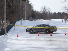 OPP respond to a shooting at the home (on left) of town councillor Bernard Cameron on Strathburn St in the town of Almonte, Ont, just west of Ottawa. (WAYNE CUDDINGTON/Postmedia)