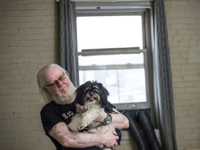 Pat Lloyd has a shih-tzu named Kelly Cupcake. He uses the services of Alberta Helping Animals Society, which offers vet and vet tech housecalls to low-income people with pets. Kelly recently had a cyst removed from her back and the cost was covered. Photo by SHAUGHN BUTTS/POSTMEDIA NETWORK