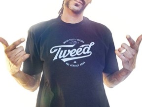 Snoop Dogg wears a Tweed shirt in a photo posted to his Twitter account on Thursday.